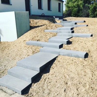 Réalisation d'un escalier sur mesure avec des mégadalles